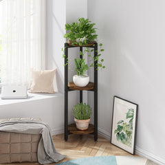 YIZAIJIA 3 Tier Plant Stand in a living room setting
