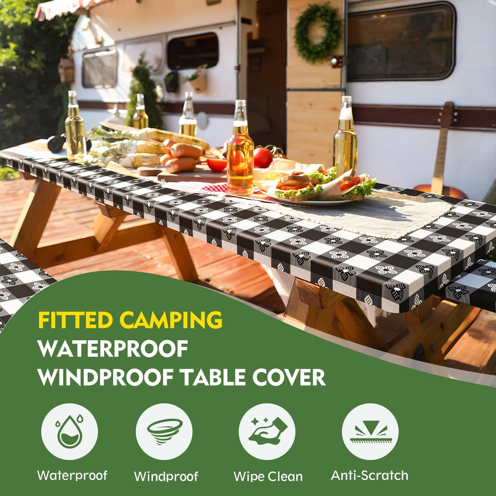 Ymomode picnic table cover laid out on a picnic table
