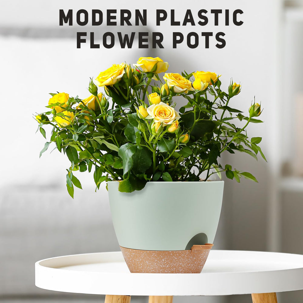 YNNICO green self watering pots set on a kitchen table
