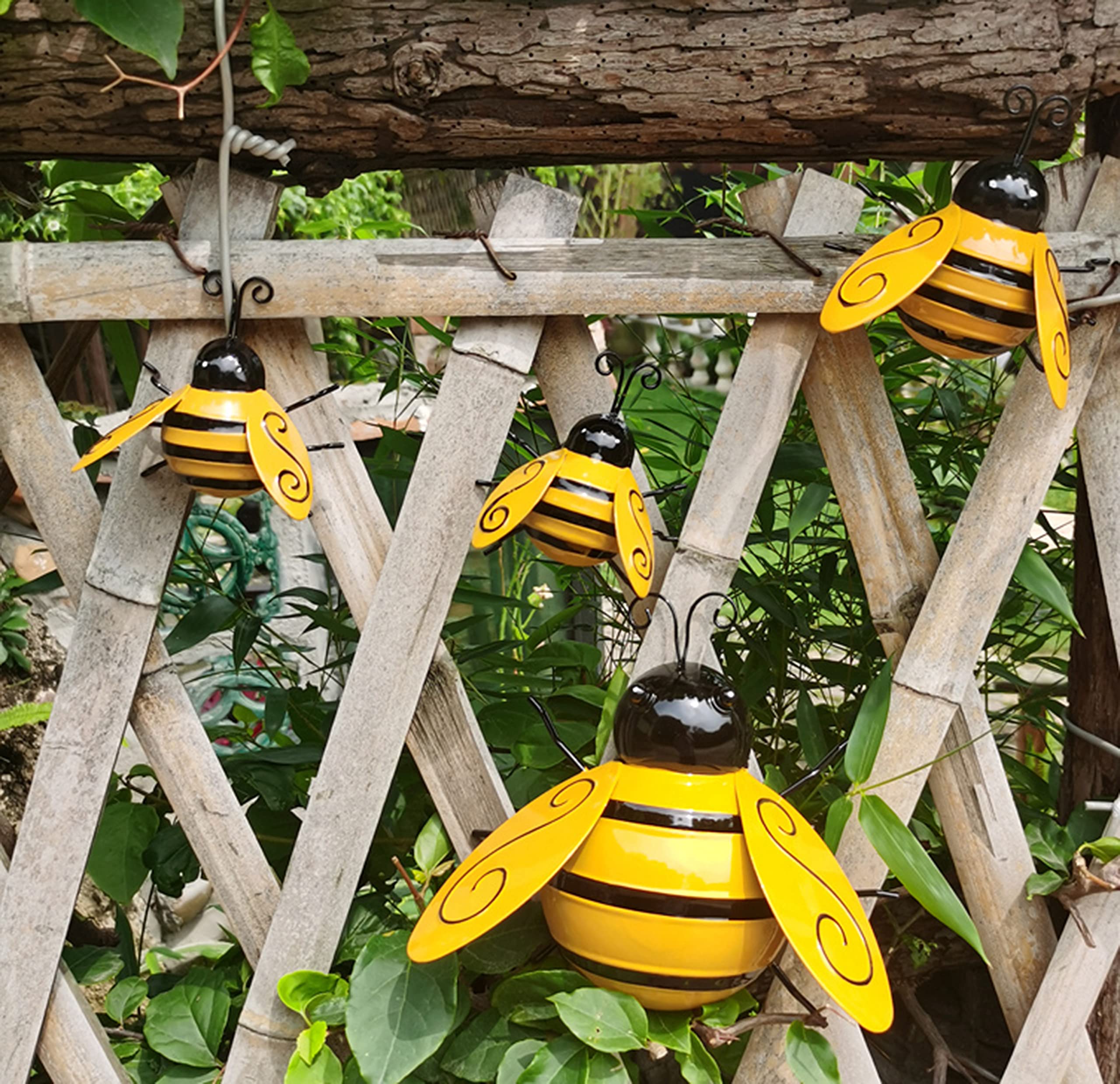Yungeln Metal Bees placed in a garden setting