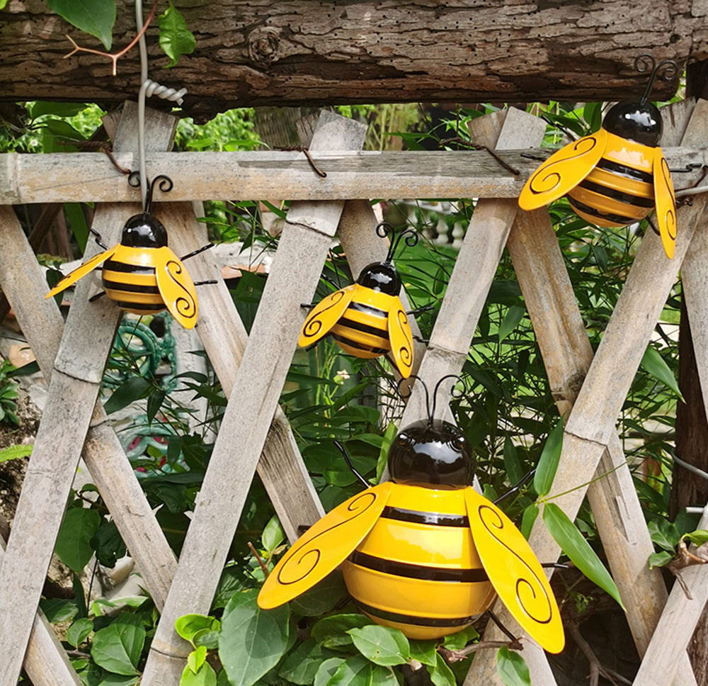 Yungeln Metal Bees placed in a garden setting