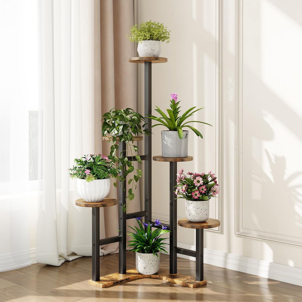 Yzosvki plant stand on a balcony with plants
