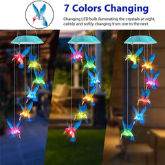 Zeiliuled Solar Hummingbird Wind Chimes displaying vibrant colours at night