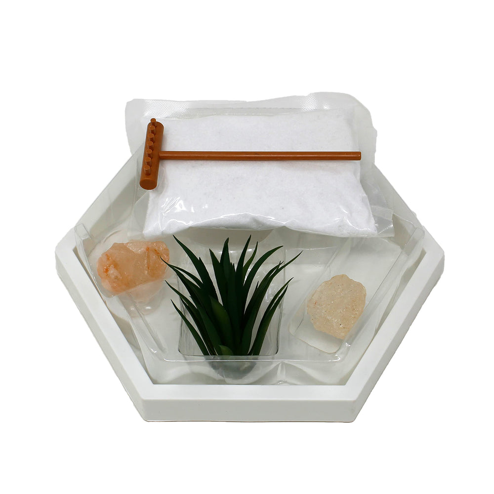 Zen Garden Kit set up on a desk with a serene background