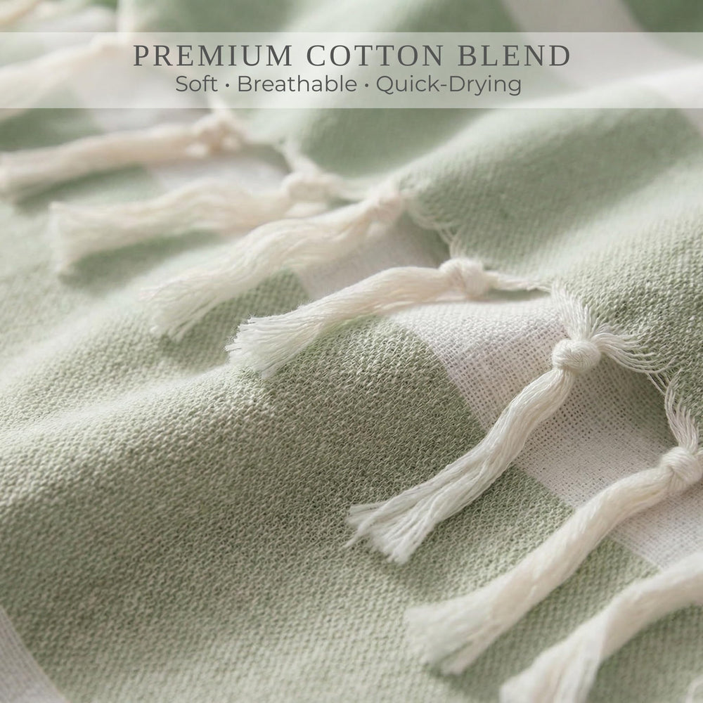 ZICOTO Beach Blanket draped poolside with calming sage tones